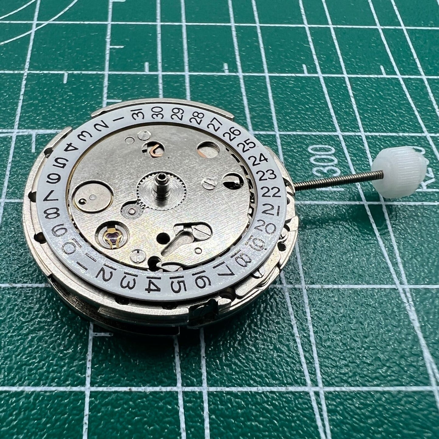 China Made 2813 mechanical watch movement with single date at 3 o'clock, precise timing for watch repairs.