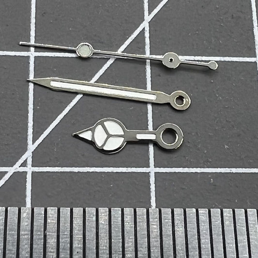 13mm silver trim watch hands with green lume, compatible with Ronda 515 quartz movement.