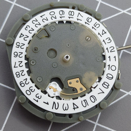 Sunon PE50 watch with 3 hands, date at 3, small seconds at 2, 6, and 10, quartz movement.