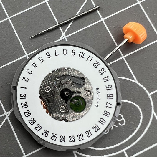 Japan Made Miyota 1M12 quartz watch movement with 3 hands and date at 6, precision timekeeping.