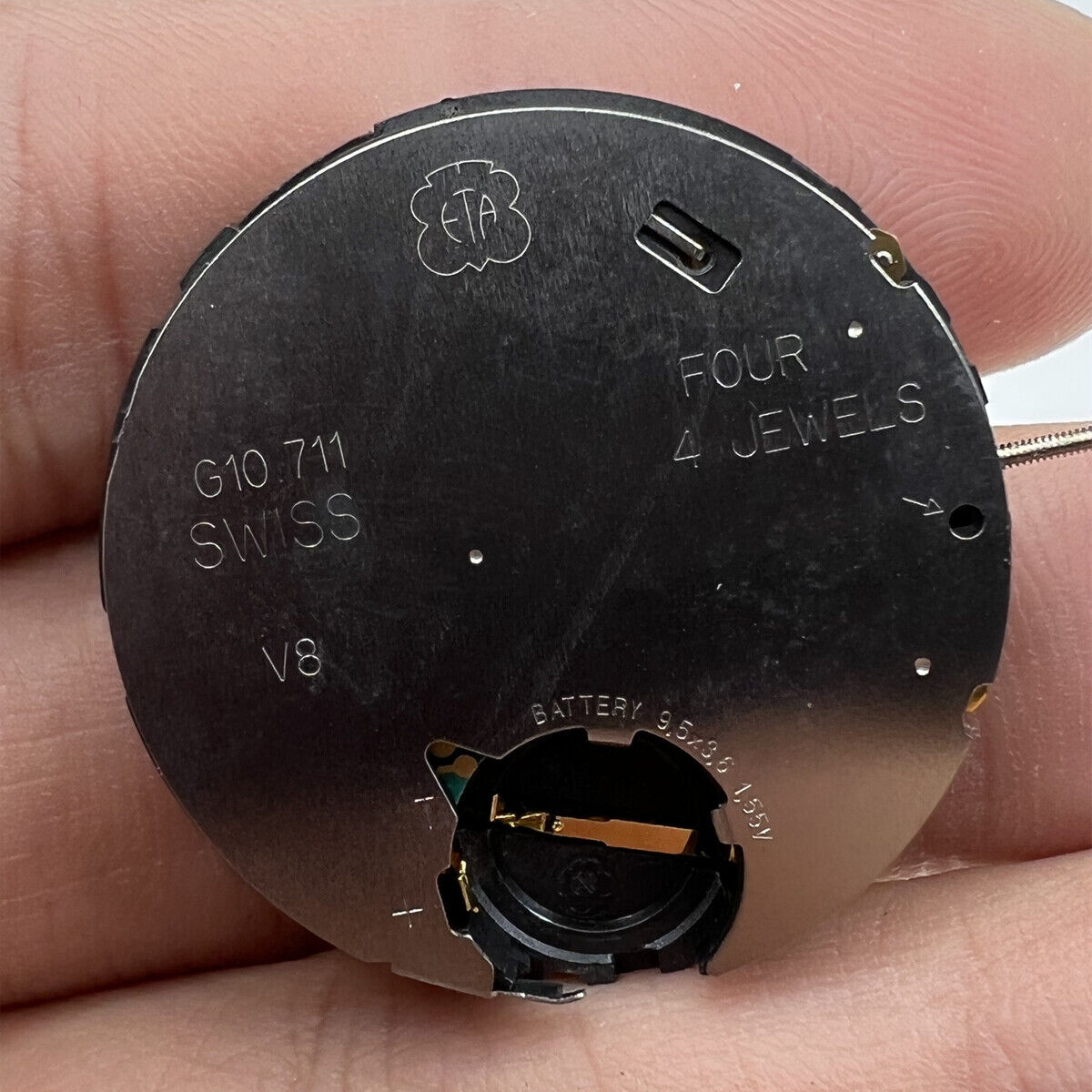 ETA G10.711 Swiss quartz watch movement featuring three hands and date for accurate timekeeping.