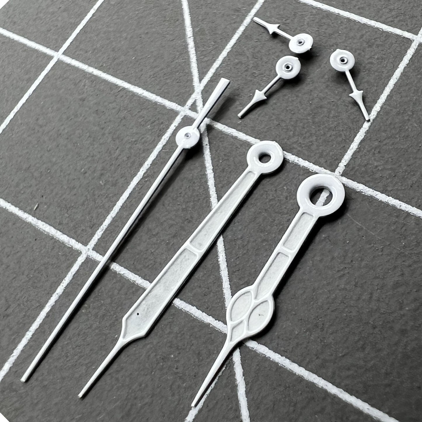 Silver-trimmed green luminous watch hands, designed for Miyota 0S20 quartz movement, boosting dial readability.