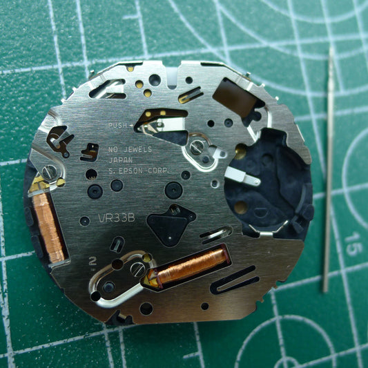 Wholesale Japan Made VR32B quartz watch movement with black dial, multifunctional features for precise timekeeping.
