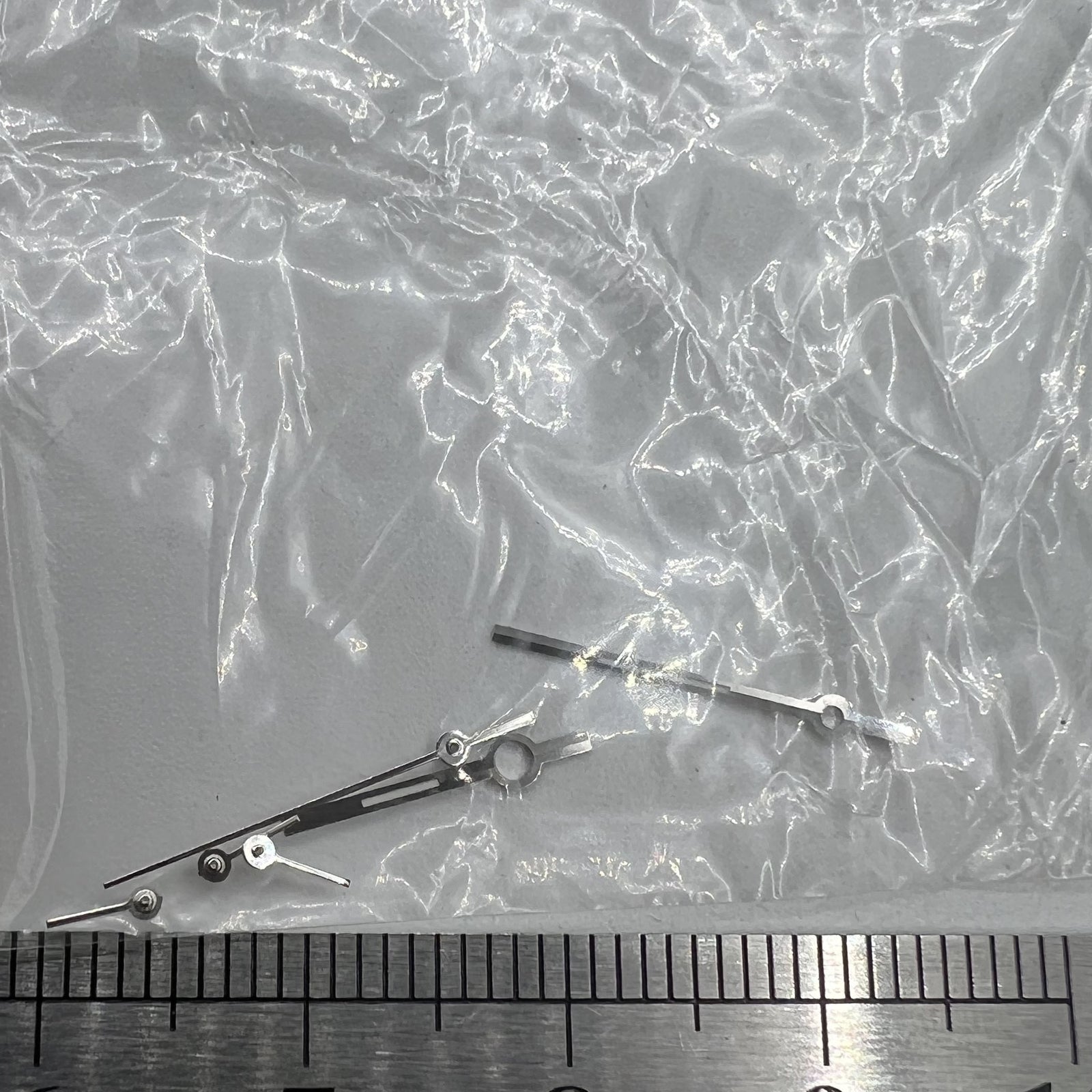 Silver trim watch hands for Ronda 5030.D quartz movement, precise style, perfect for upgrades.
