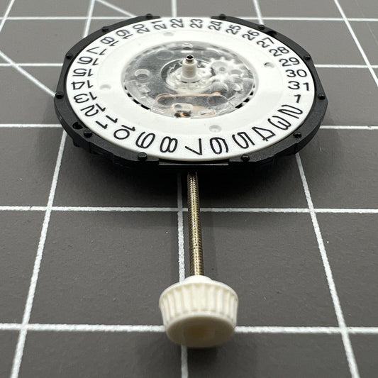 LG32 quartz watch movement repair part showing date display at 3 o'clock position for precision timekeeping.