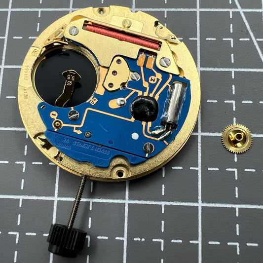 Swiss ETA 955.112 quartz watch movement showing 3 hands and date at 3, precision Swiss brand