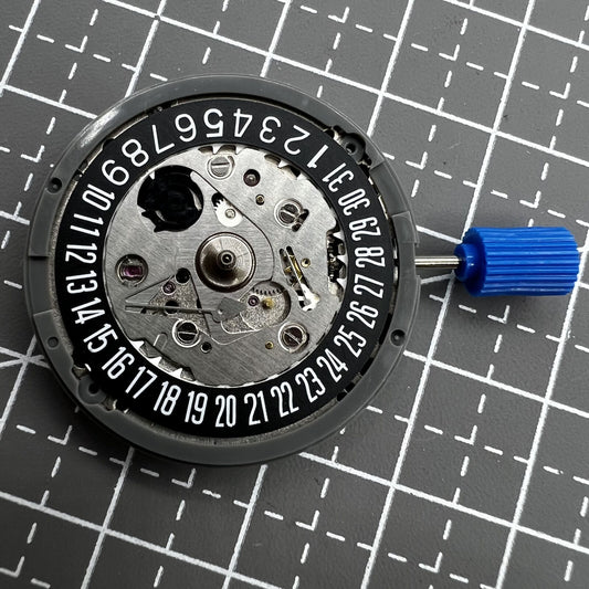 SEIKO NH35 black disk mechanical automatic watch movement with date at 3 o?clock angle.