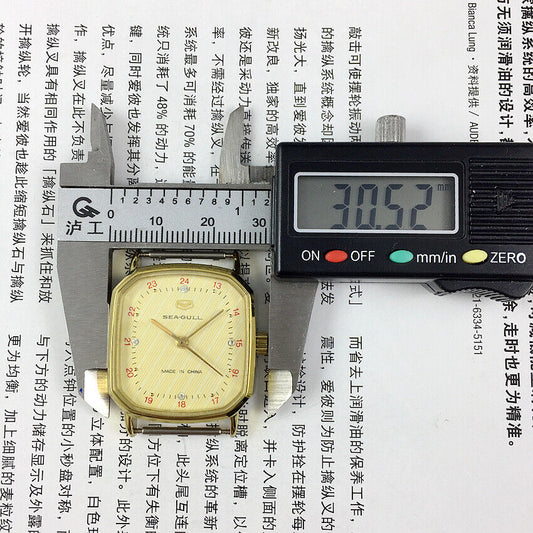 28mm Seagull ladies watch with golden square case and manual mechanical movement, elegant golden nail markers.