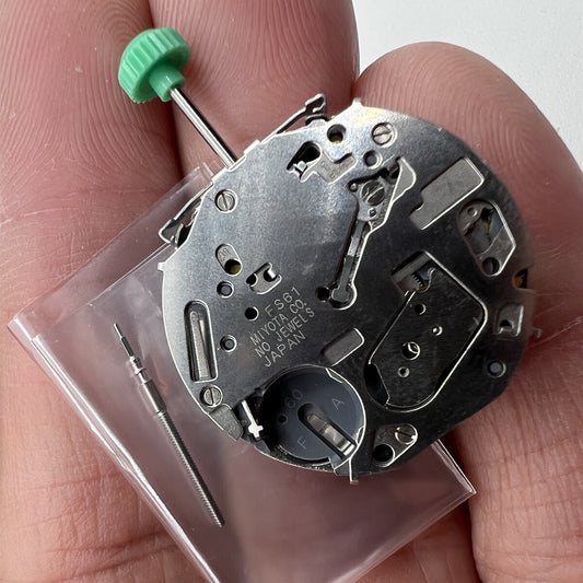 Japan-made Miyota FS61 chronograph watch movement with date at 4, for precise quartz timekeeping.