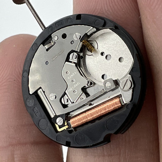Ronda 505 Swiss quartz watch movement with date display at 6 o'clock, precision timing.