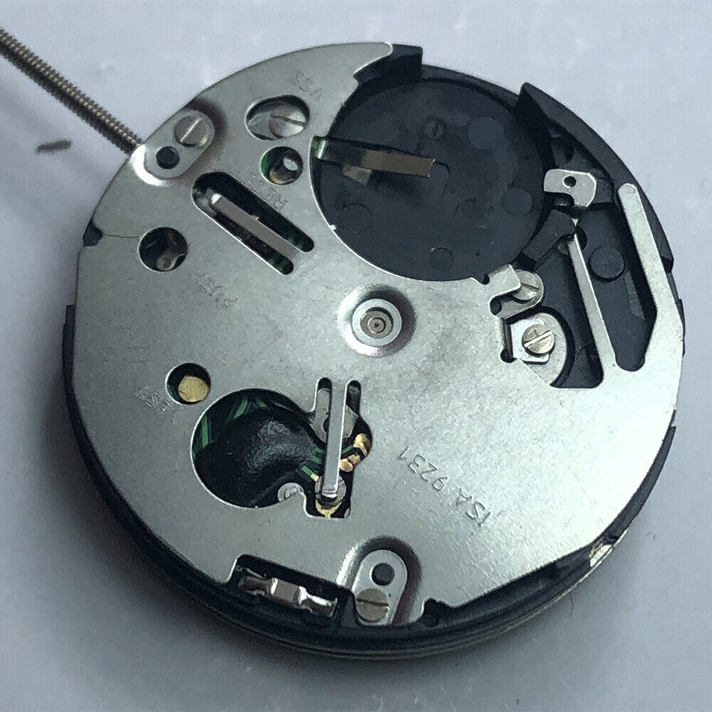 Swiss Made ISA 9231 quartz movement watch part with star moon phase at 6 for precise timekeeping.