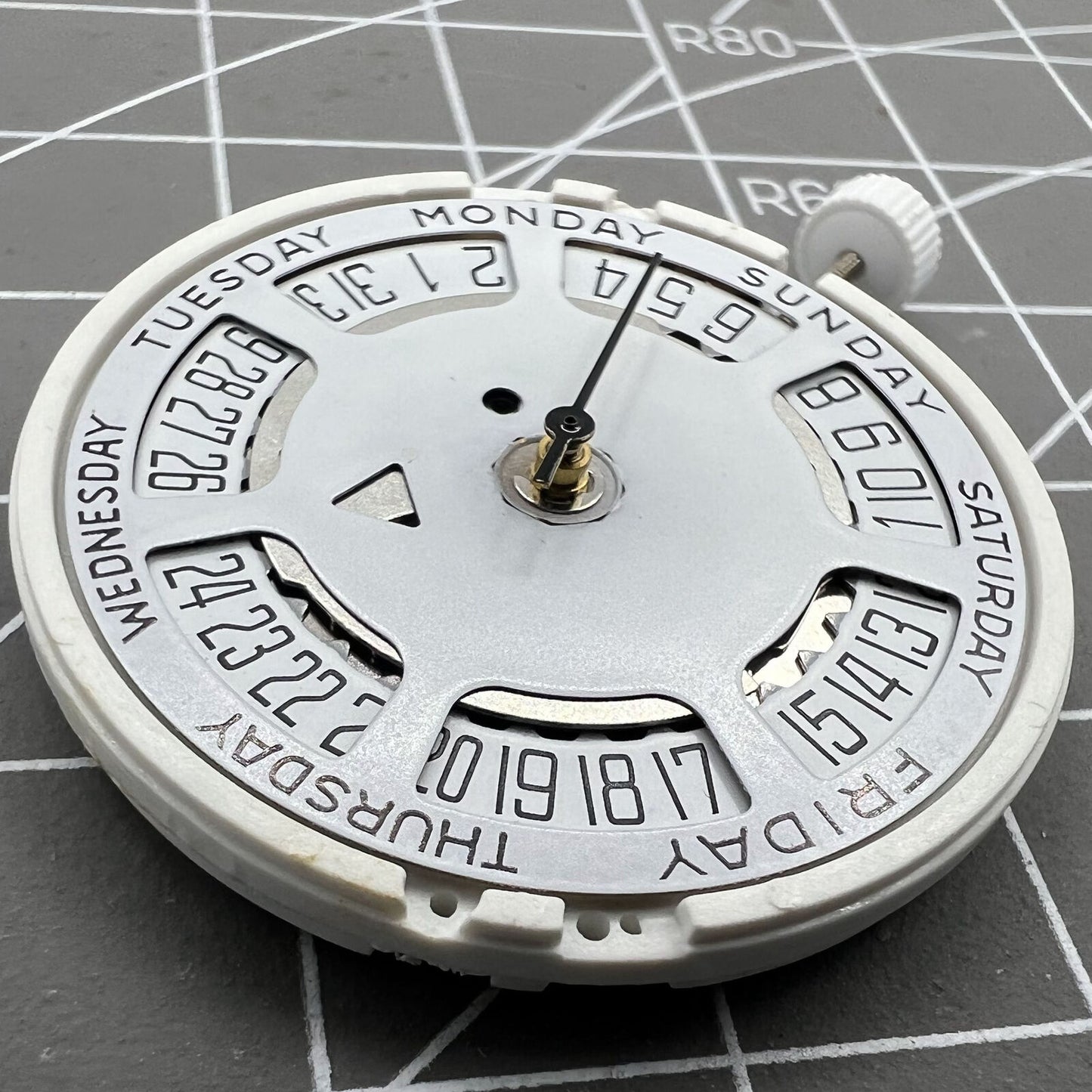ISA 1198 quartz watch movement with day-date display, white dial, date at 6 o'clock, replacement part.