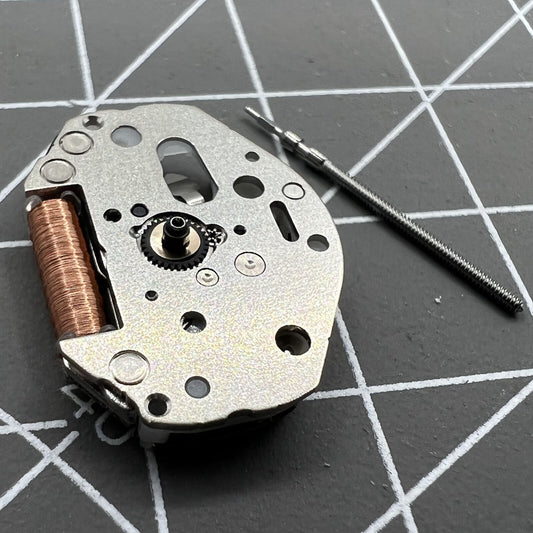 Miyota 2035 quartz movement with watch stem, reliable Japan-made component for precise timekeeping.