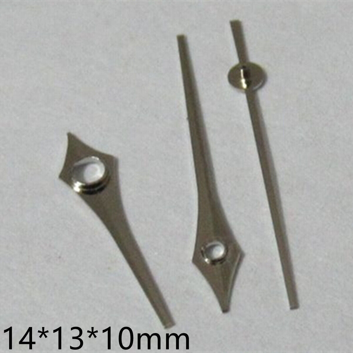 Silver arrow-shaped watch hands set, 14mm, compatible with Miyota 2035/2115, precision accessory.