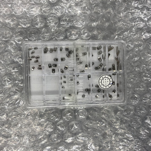 Casing clamps for watch movements, 10 sizes, 100pcs total, ideal for precise assembly.