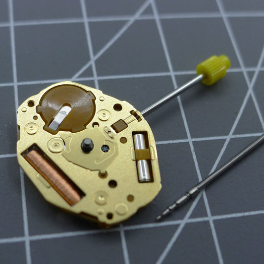 Close-up of Japan Made Miyota GL20 quartz watch movement with gold 2-hand design by Miyota.