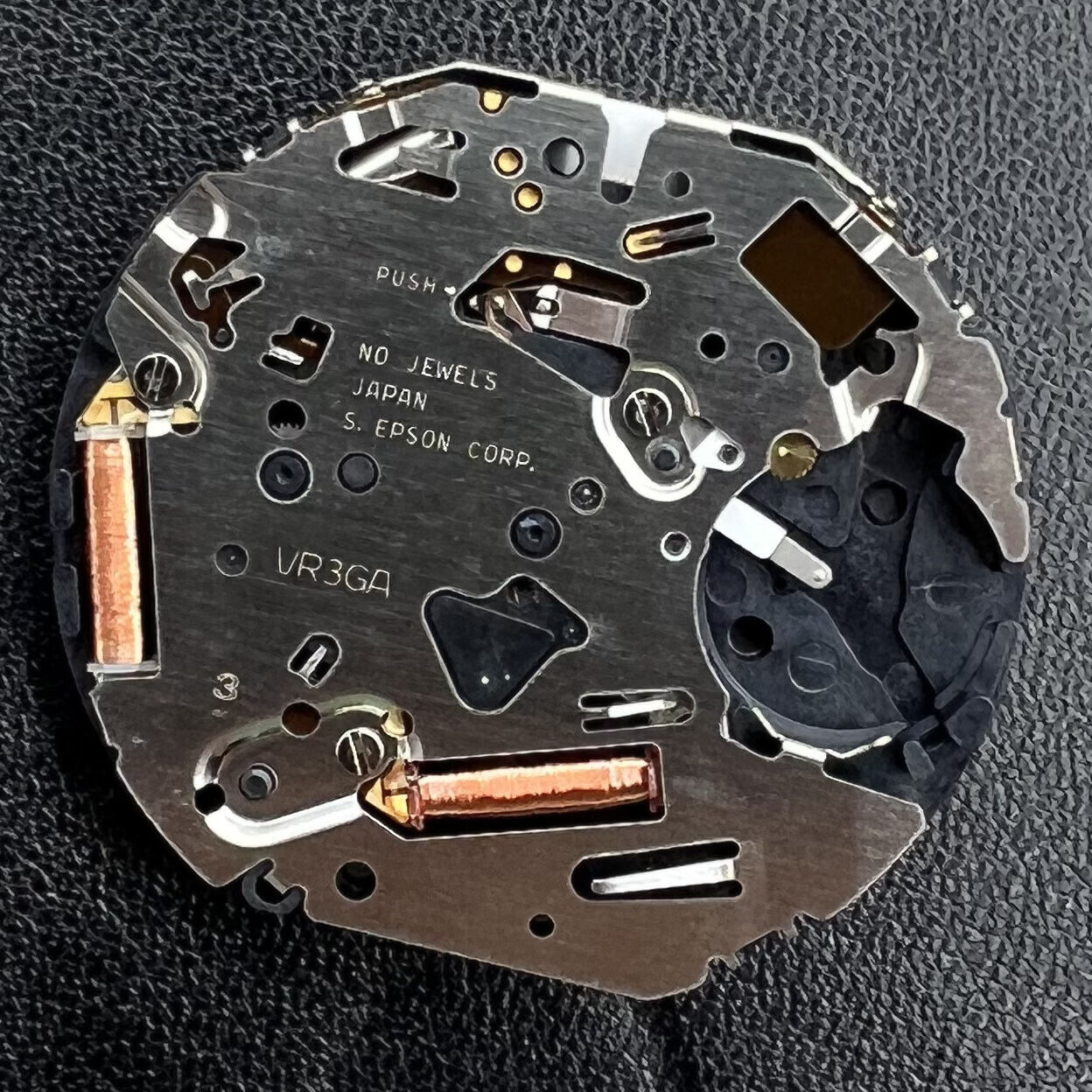 Hattori Epson TMI Japan VR3G quartz watch movement, precise timekeeping for watch repair accessories.