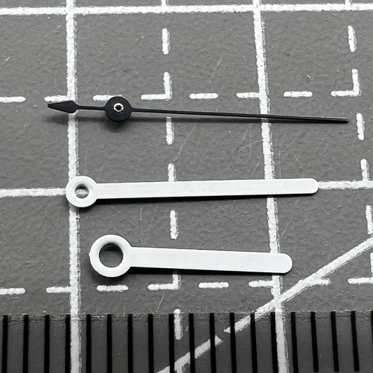 Set of 2 white 12mm pointed watch hands for Ronda 515 movement, perfect for precise repairs and upgrades.
