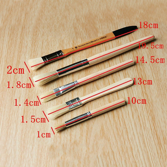Set of 4 wooden handle soft brushes for watch repair and dust cleaning.