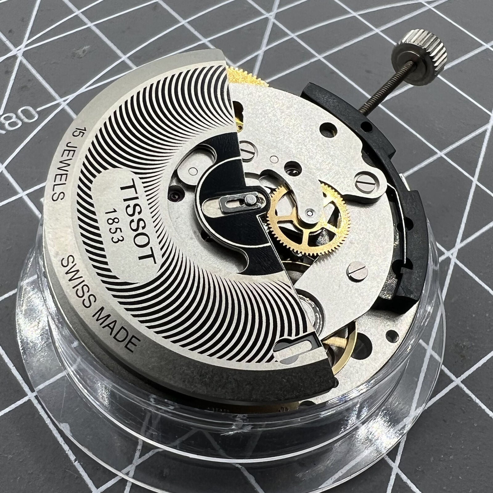 Tissot ETA C01.211 Swiss chronograph watch movement with white dial, precision accessory for timepieces.