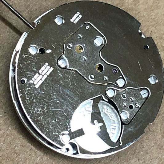 Swiss Part Ronda 5021.D watch movement with 5 hands and black date wheel at 6 o'clock, precision timepiece.