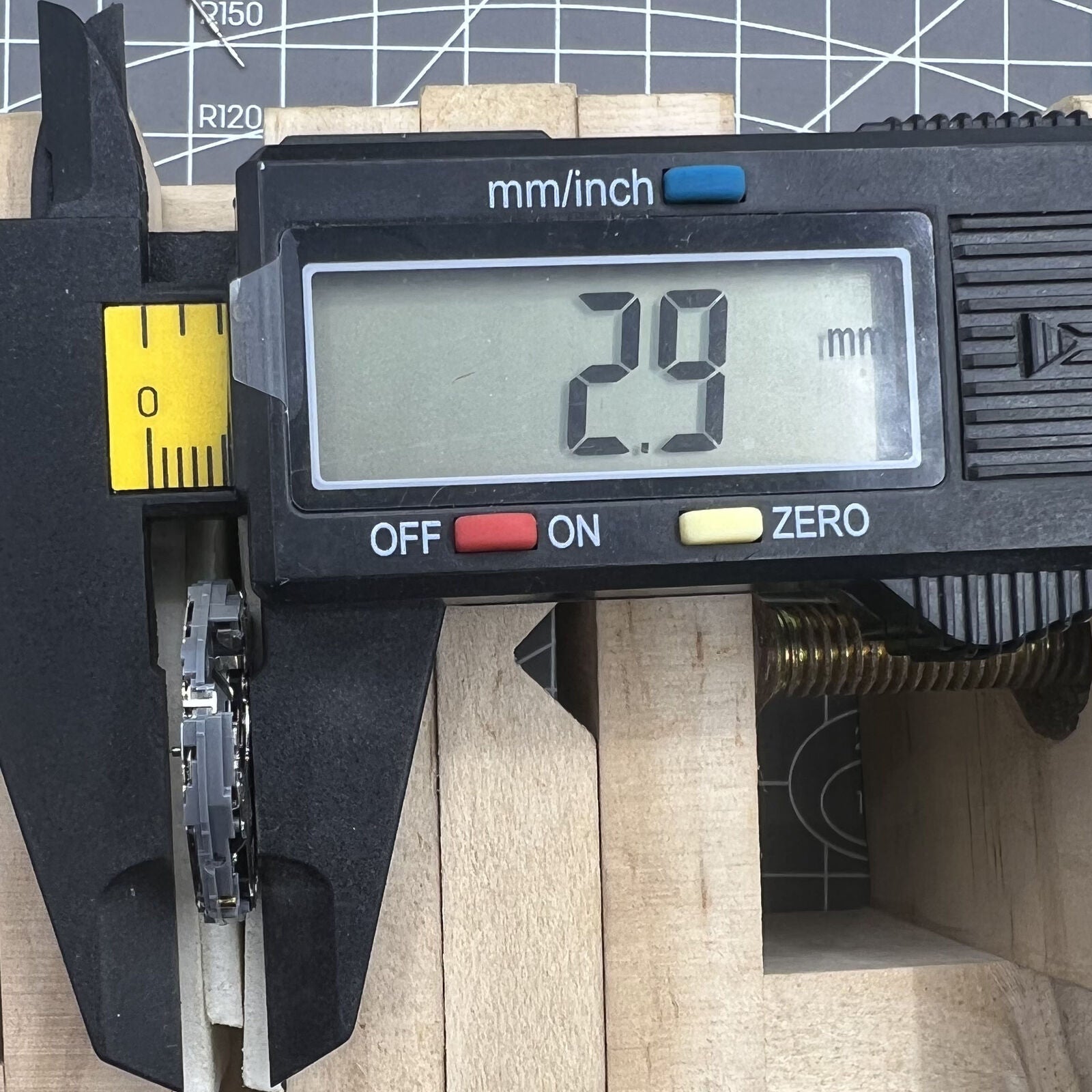 Hattori Epson TMI VH68A quartz watch movement, precise timekeeping component for watch repairs.