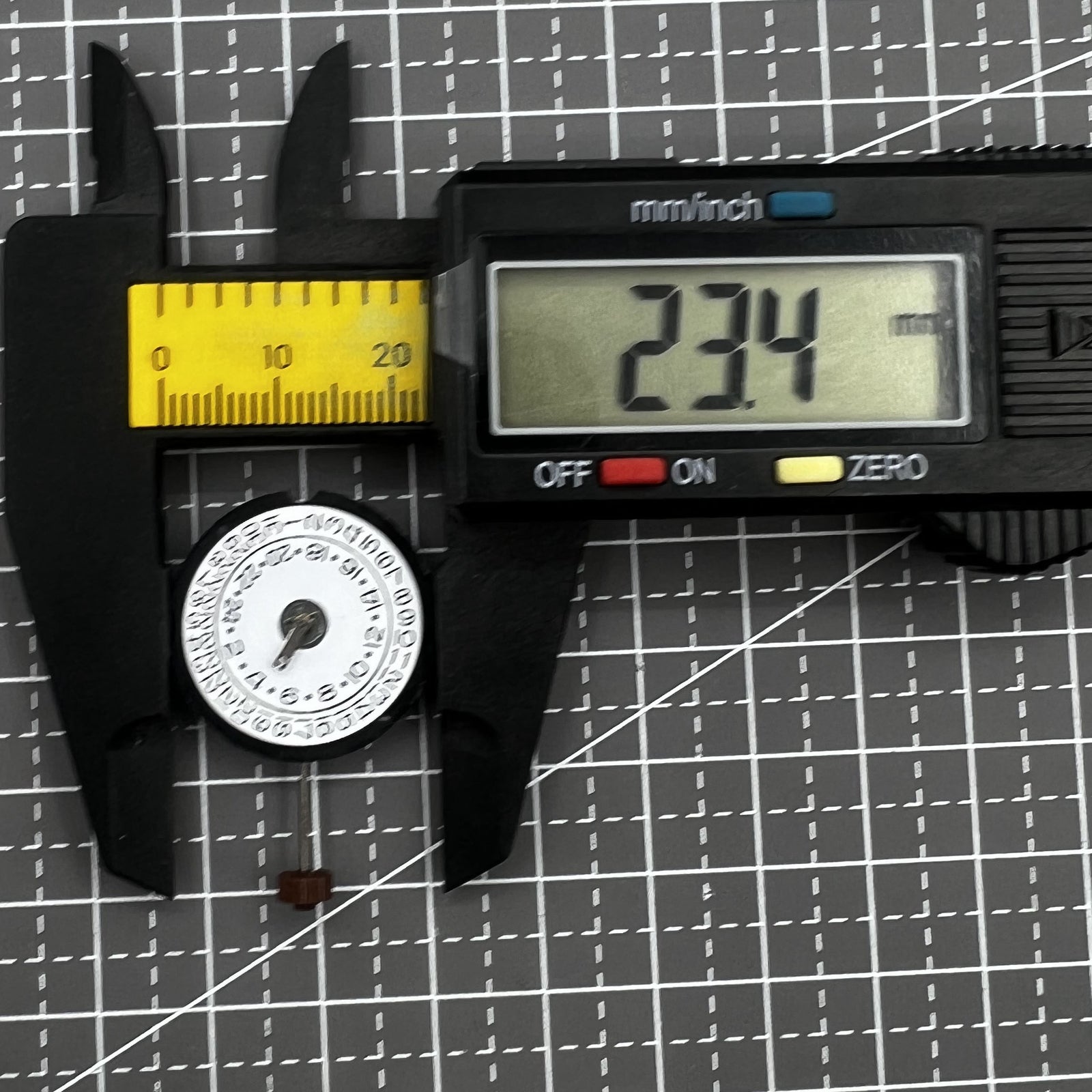 Ronda 505 24D quartz watch movement with date display at 3 o'clock, precise Swiss timekeeping mechanism.