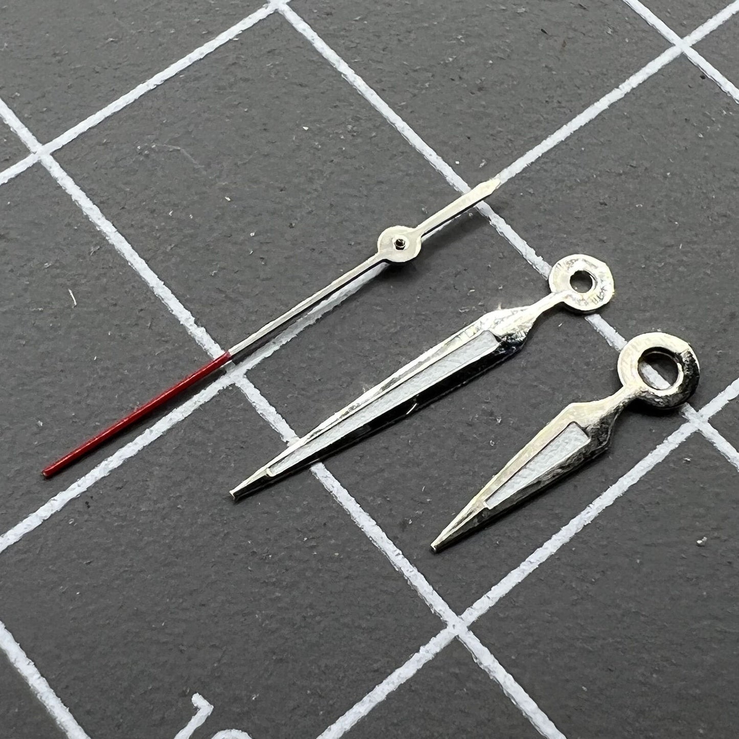 Luminous arrow-shaped watch hands for Miyota 2035, improving night-time visibility.