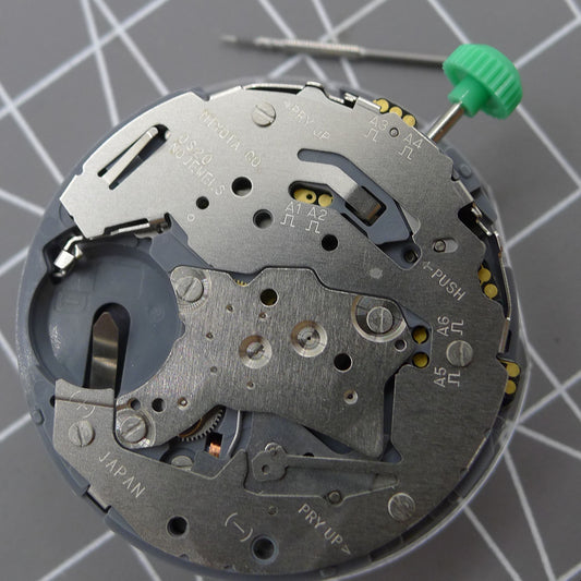 Japan Miyota OS20 quartz watch movement with date display at 4:30, precise and reliable for watchmakers.