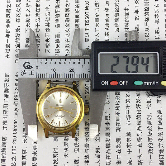 27mm Kongque silver dial watch with golden markers, manual mechanical movement, 19 jewels, China made.