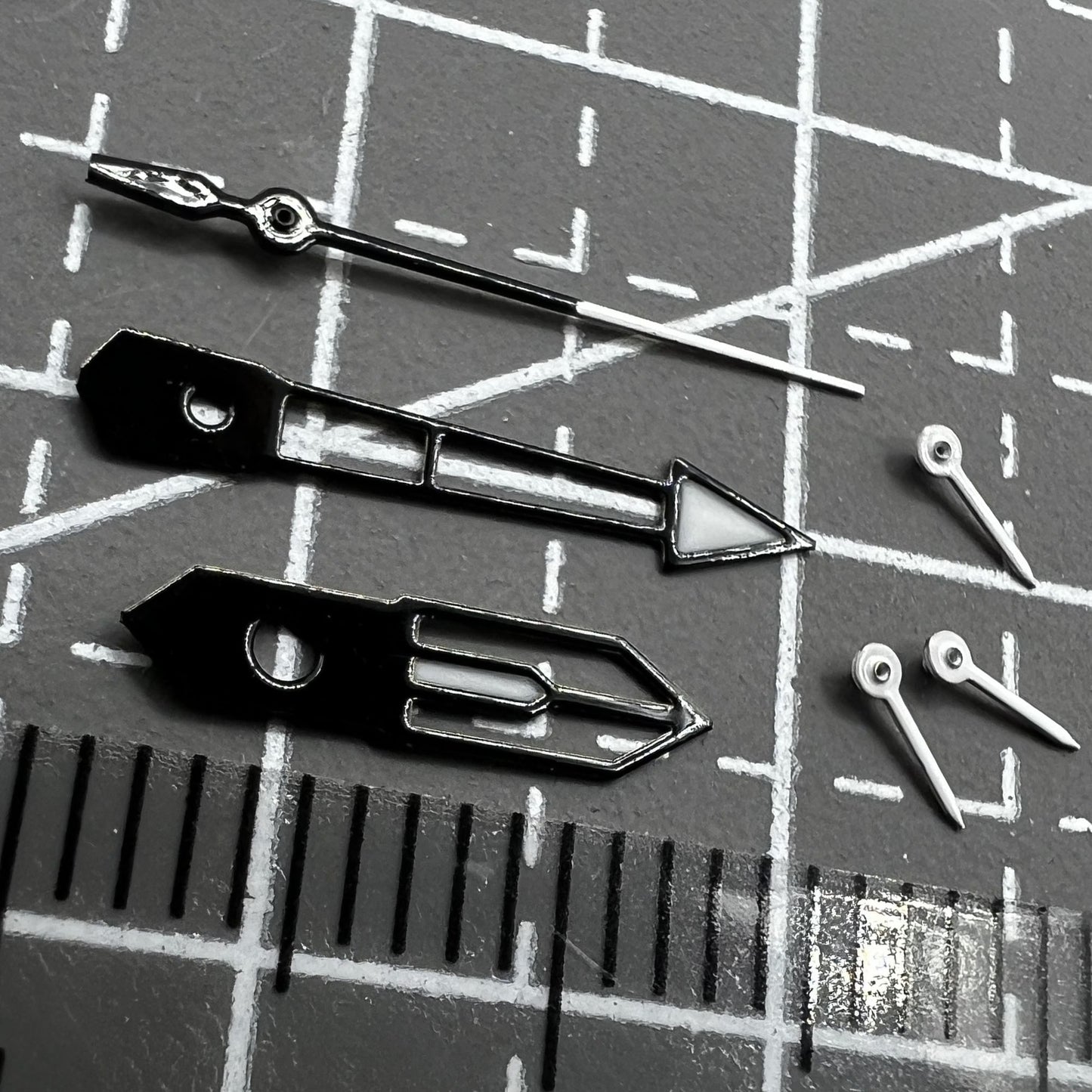 13mm green lume watch hands with white and black trim by PE90, ideal for precise timekeeping movements.