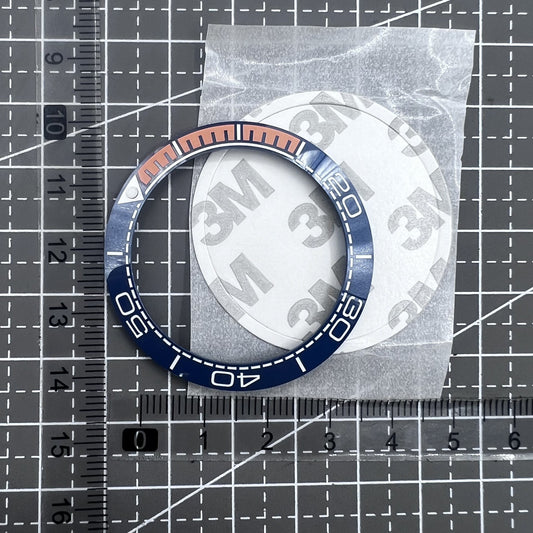 Dark blue ceramic bezel insert with orange font, 41.5mm/32.5mm size for watch repair.