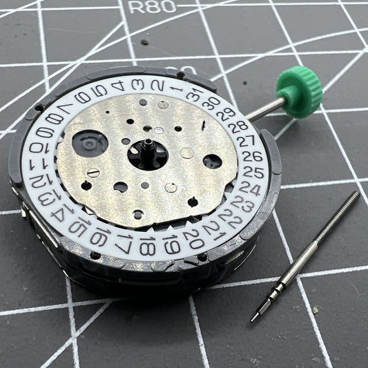 Miyota FS20 chronograph watch movement with date at 3, precision quartz, Japan made.