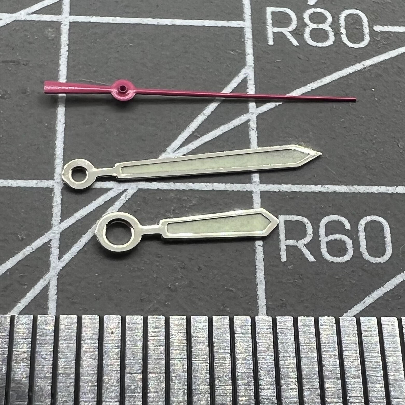 Silver-trimmed green lume watch hands set, 12.5mm, compatible with Ronda 515 quartz movement.
