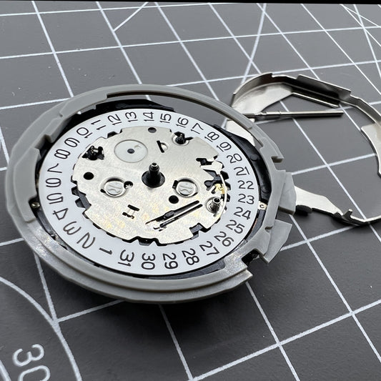Hattori Epson TMI YM82A quartz watch movement by Japan Made, precise timekeeping for accessories.