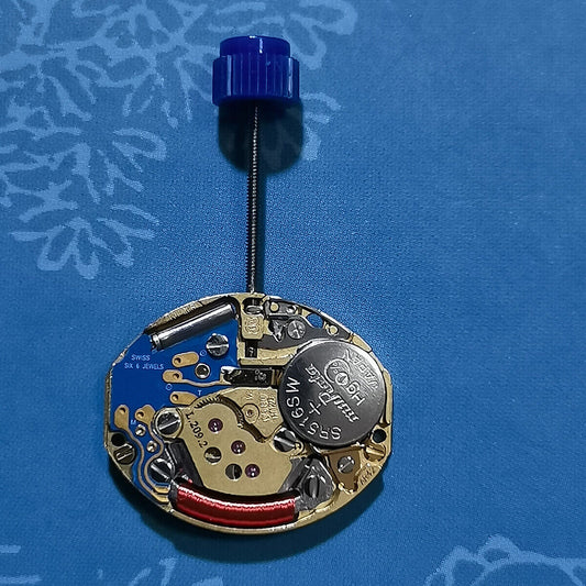 Swiss Made E03.001 quartz watch movement with 2 hands, ideal for precise watch repairs and replacements.