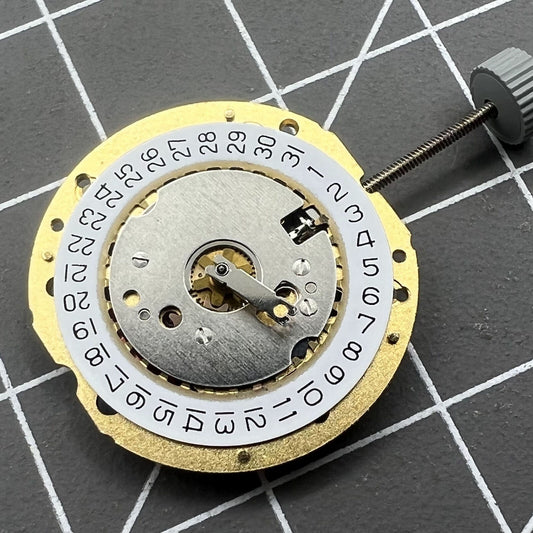Swiss Ronda 785 quartz watch movement with date at 4 o?clock, 3 hands, precise timing for watchmakers.