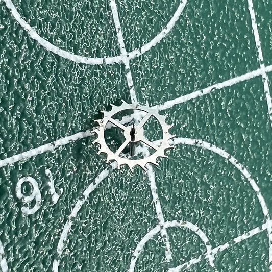 Escape wheel for Dandong 7750 watch movement, precise replacement part for repair and maintenance.