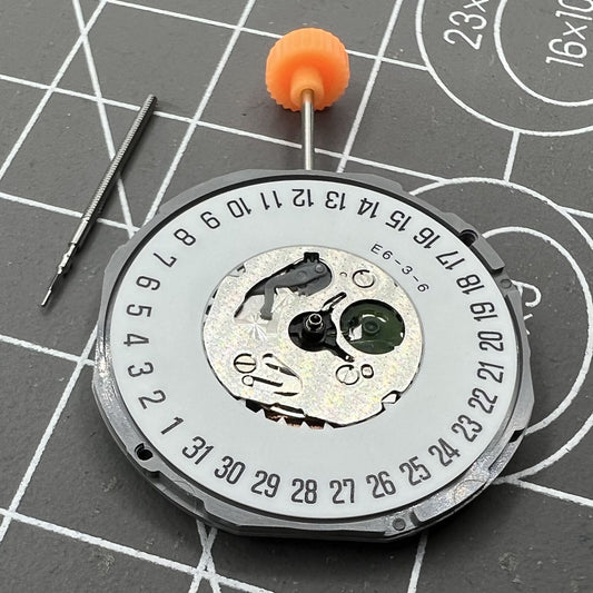 Japan Made Miyota 1M12 quartz watch movement with 3 hands and date at 6, precision timekeeping.