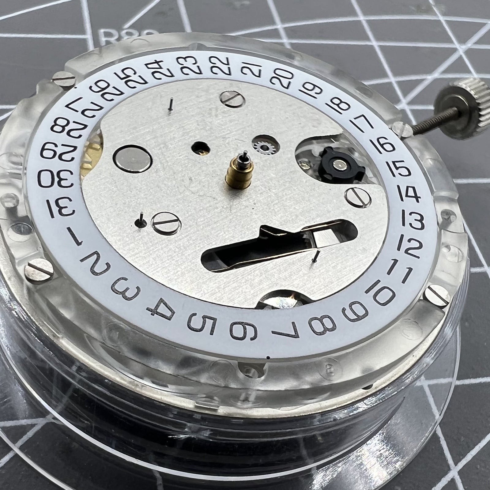 Tissot ETA C01.211 Swiss chronograph mechanical watch movement with white dial for precise timekeeping.