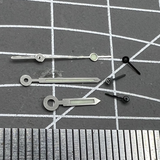 Silver trim green lume watch hands for Miyota OS10 movement, precise and luminous accessory.