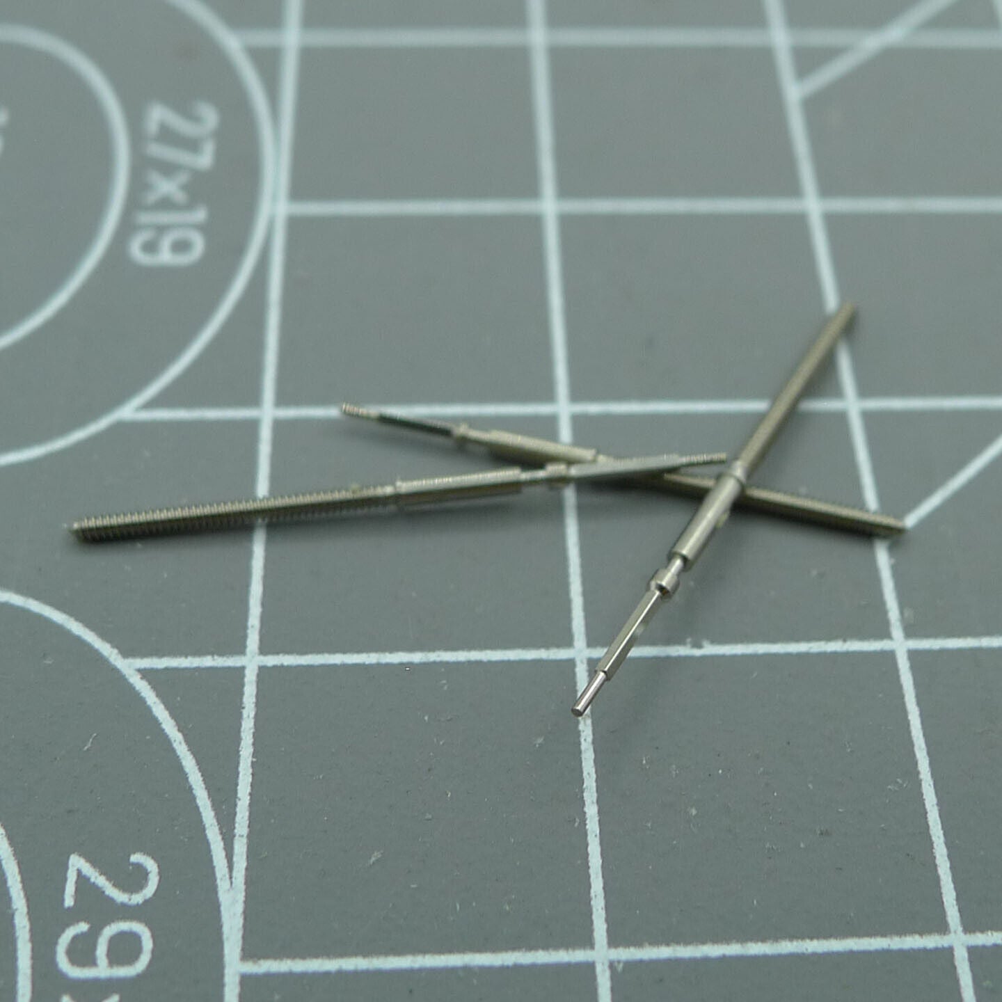 Ronda 6003D winding stem for quartz watches, durable replacement part ensuring precise fit and function.