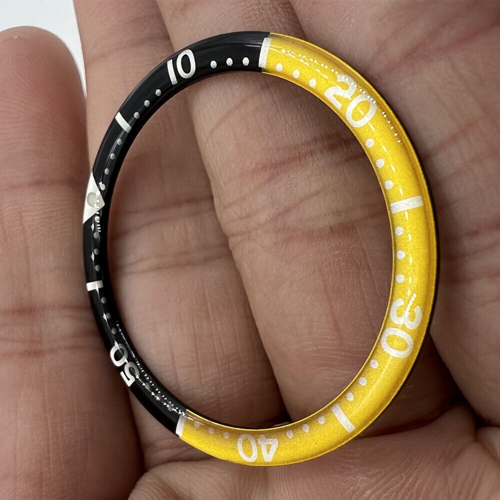 Black yellow circular arc bevel aluminum bezel insert for 39mm watch, enhancing style and durability.