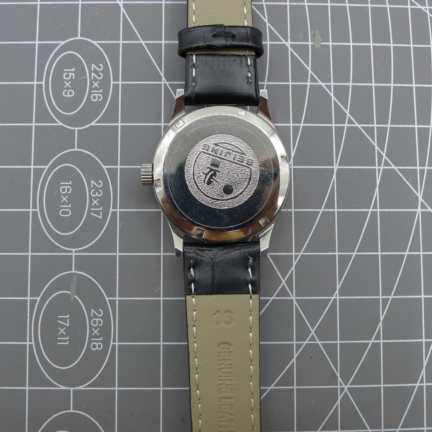 Beijing 31mm manual mechanical watch with silver case, double rhomb dial, showcasing classic Chinese craftsmanship.