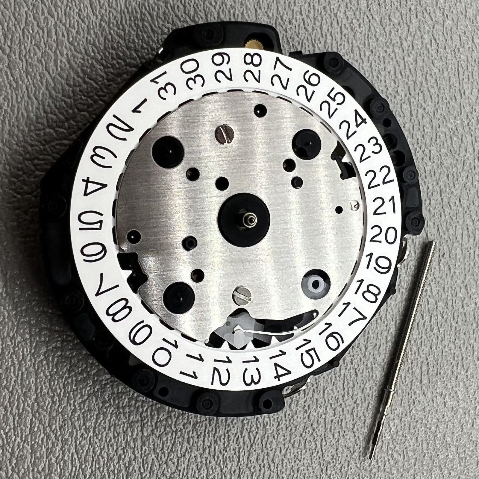 Japan Hattori Epson VD57C quartz watch movement, precise timekeeping for watch repair accessories.