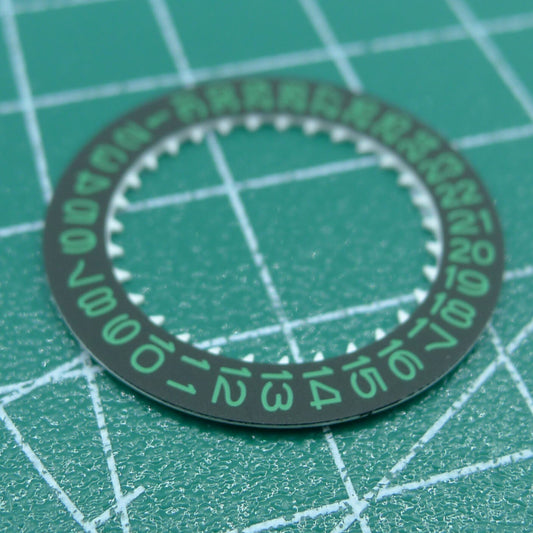Green font date disk with black background for NH35 watch movement, ideal for watch repairs and customization.