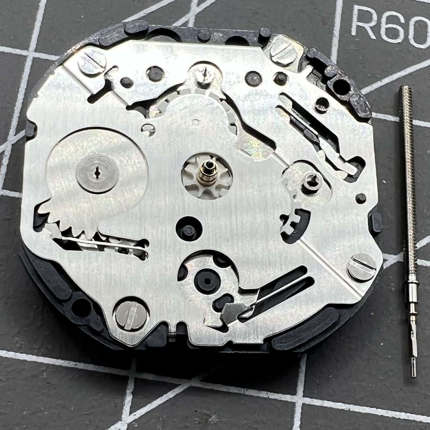 Japan Made Hattori Epson TMI VX3J quartz watch movement, precise timekeeping mechanism for watch accessories.