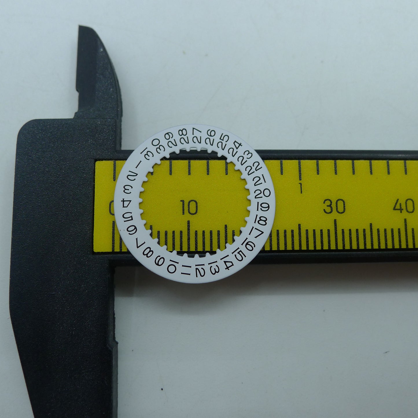 White date disk wheel for RLX 3235 movement, precise fit ensures accurate date display replacement.
