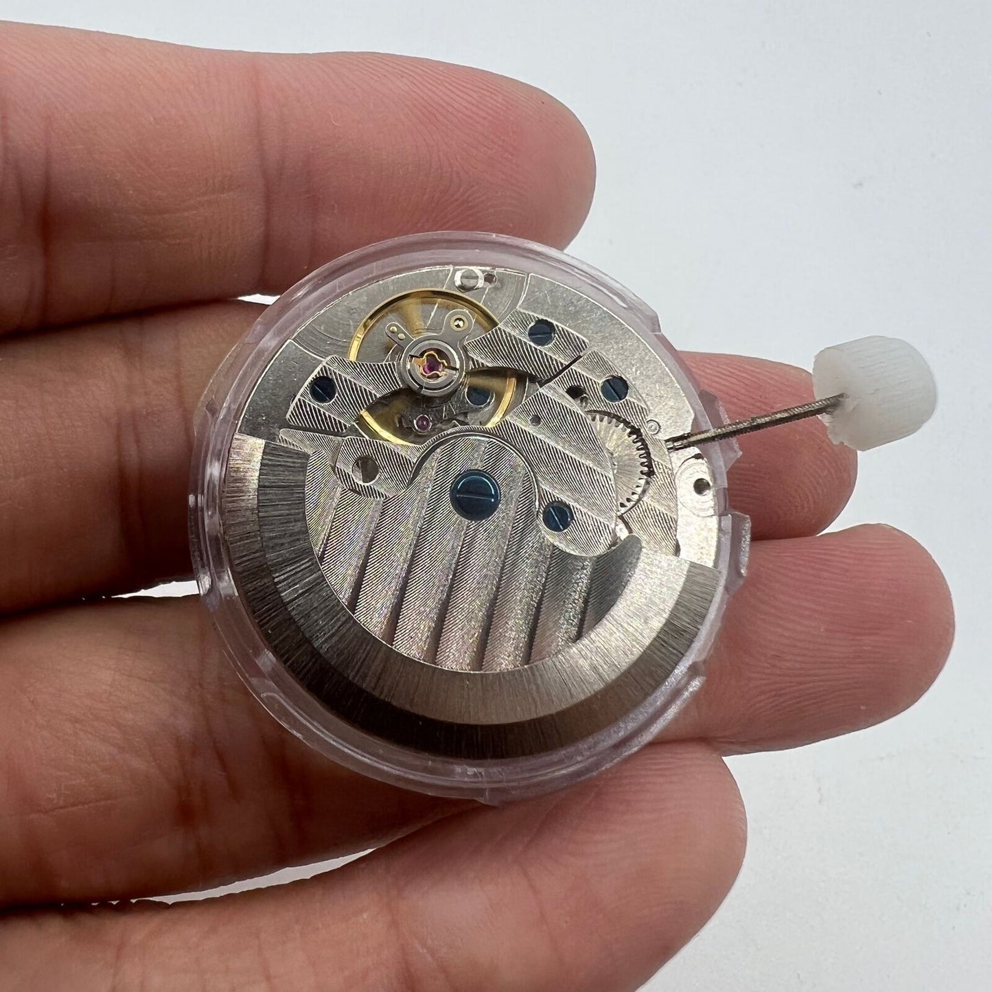 Shanghai LB20 automatic watch showcasing moon phase at 6 o'clock and big date at 12, Chinese craftsmanship elegance