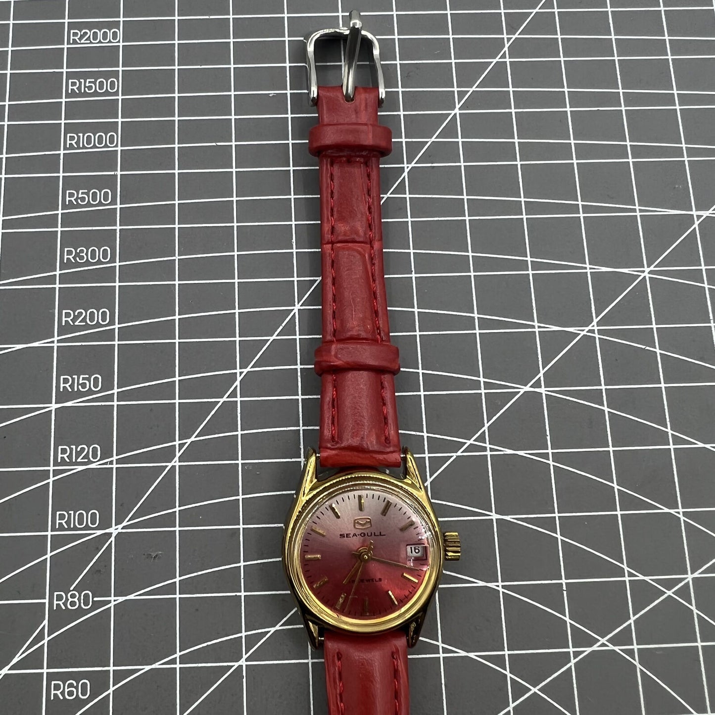 Montre mécanique manuelle Seagull pour femme, rouge, dégradé, clou doré, calendrier simple